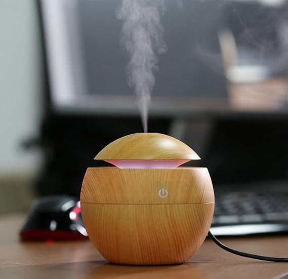 revolusis-Essential-Oil-Diffuser-Aroma-Air-Humidifier-with-Colorful-Change-1.jpg